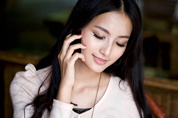 istock Woman with Cellphone in bar 171223386
