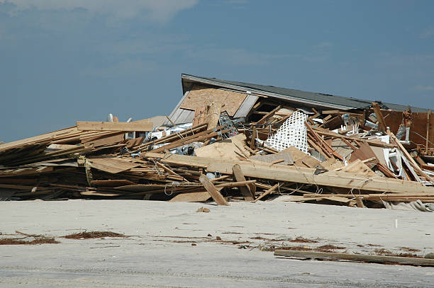 istock Collapsed House on Beach due to Hurricane 171223524