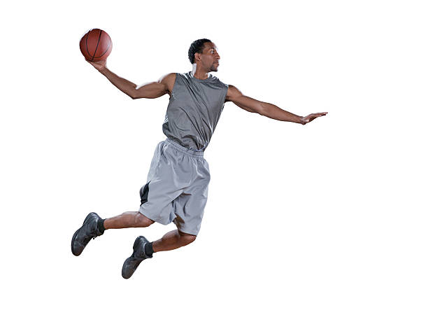 istock Basketball player in mid-air doing a jump shot 171223695