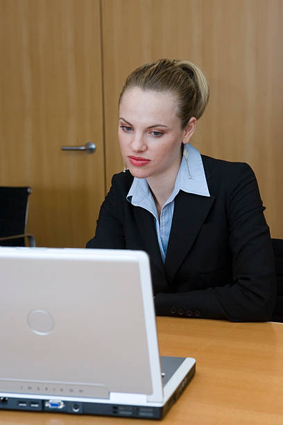 istock Business Woman with Laptop in Office 171224556