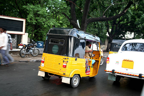 Traffic in Chennai, India "Traffic in Chennai, India" auto rickshaw taxi india stock pictures, royalty-free photos & images