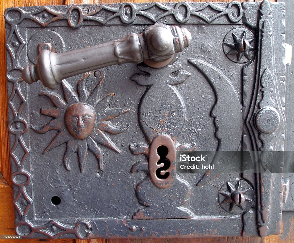 old ornate doorlock details of a nice old door lock Black Color Stock Photo