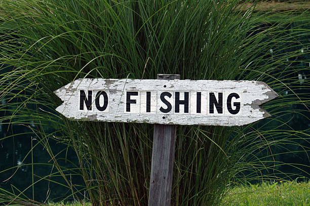 No Fishing Sign On Post Stock Photos, Pictures & Royalty-Free Images -  iStock