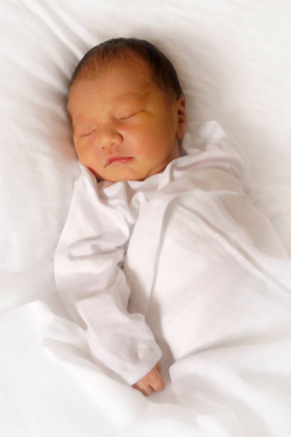 istock Newborn Baby Sleeping 171225289