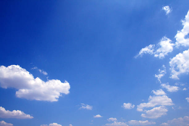 Deep blue view on a lightly clouded day A deep blue view on a lightly clouded day. Room for text.  small group of objects stock pictures, royalty-free photos & images