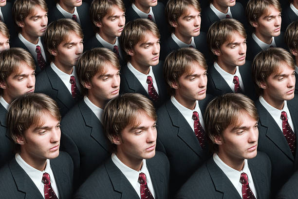 Businessman production A group pf similar businessman rows.http://www.x-grounds.com/sample.jpg cloning photos stock pictures, royalty-free photos & images