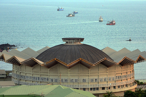 Conakry, Guinea: Mohammed V Palace formerly known as the Palais des Nations, a conference hall originally built for the 1978 Organization of African Unity summit, heavily damaged in a bombardment by mutinous troops in 1996 - located by the harbor, 1st Avenue - Tombo island.