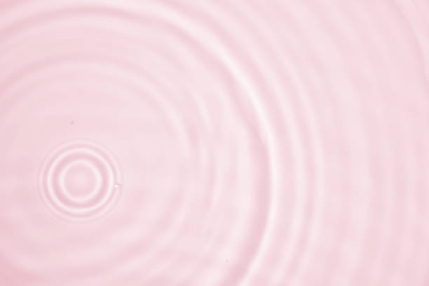 istock Abstract transparent water shadow surface texture natural ripple on pink background 1712312819