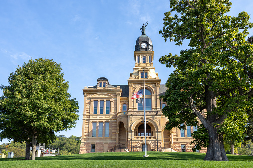 This image shows a landscape view of the historic Blue Earth County Courthouse in Mankato, Minnesota, built in 1889, and listed in the National Register of Historic Places.