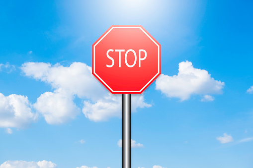 Blue sky and white cloud soft. Icon stop sign with sky background