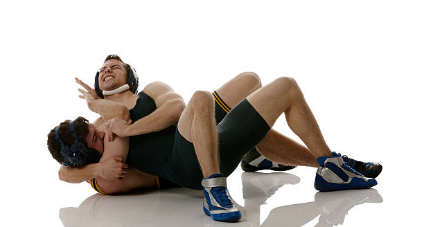 Two men wrestling Two men wrestlinghttp://www.twodozendesign.info/i/1.png wrestling sport stock pictures, royalty-free photos & images