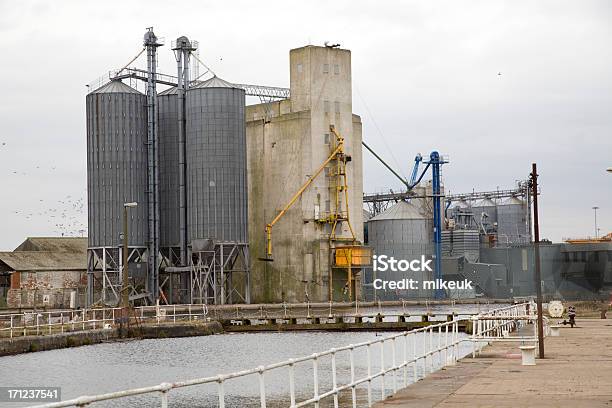 Industrial Dock Storage Buildings Stock Photo - Download Image Now - Commercial Dock, Crane - Machinery, Equipment