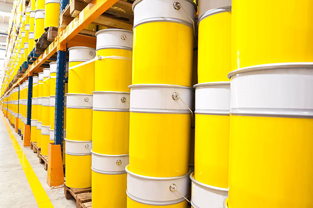 A large stock of industrial sized paint cans