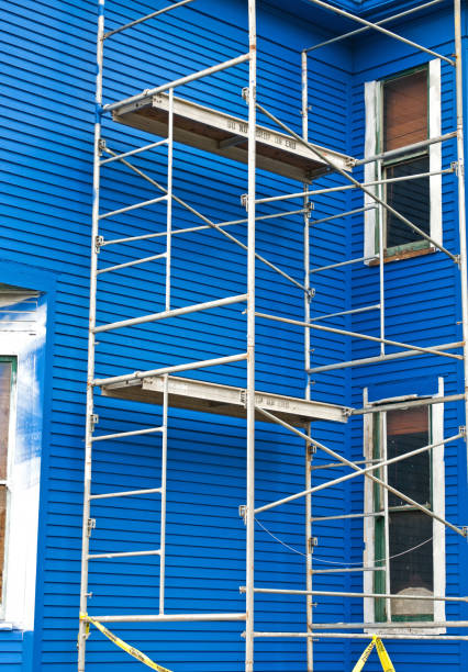 istock Old house being painted blue 171238254