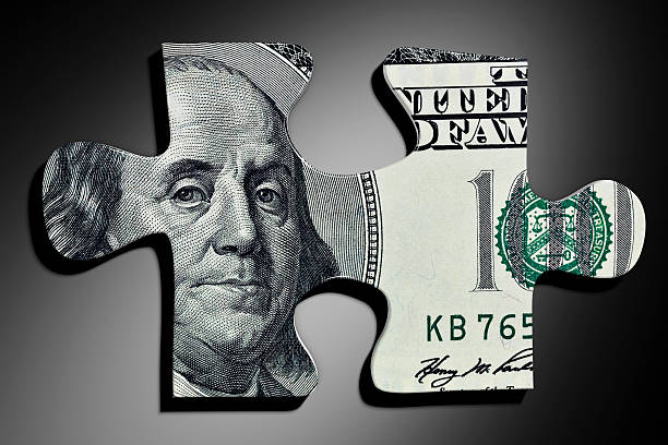 istock The image of Banjamin Franklin within a jigsaw puzzle piece 171238610