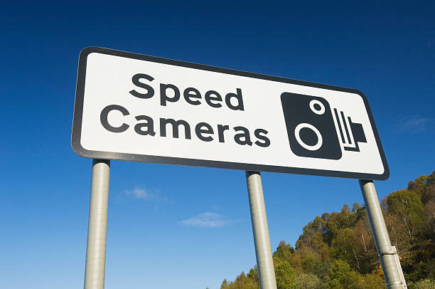 Speed cameras sign stock photo