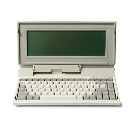 vintage laptop on white background