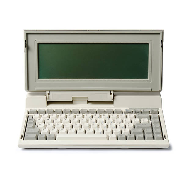 Early laptop computer with attached keyboard vintage laptop on white background computer mainframe old retro revival stock pictures, royalty-free photos & images