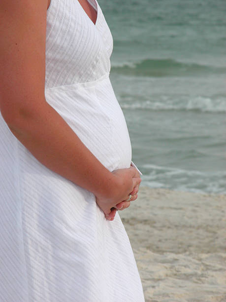 Pregnancy Hands on Tummy stock photo