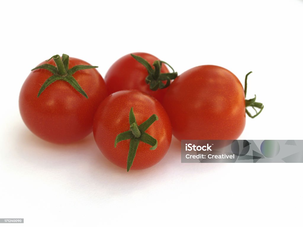 Tomates cerises - Photo de Fond blanc libre de droits