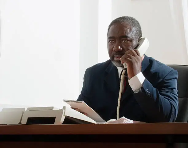 African American middle age Businessman having a business meeting in his office