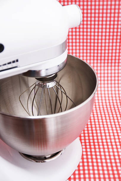 istock White metal mixer on red and white plaid background 171241216