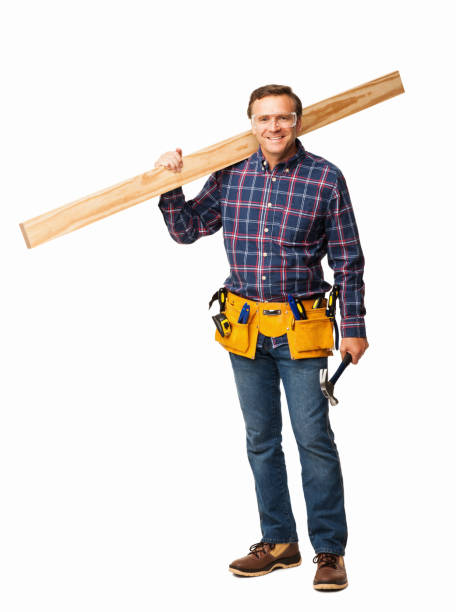 istock Male Carpenter Carrying a Wooden Plank - Isolated 171241289