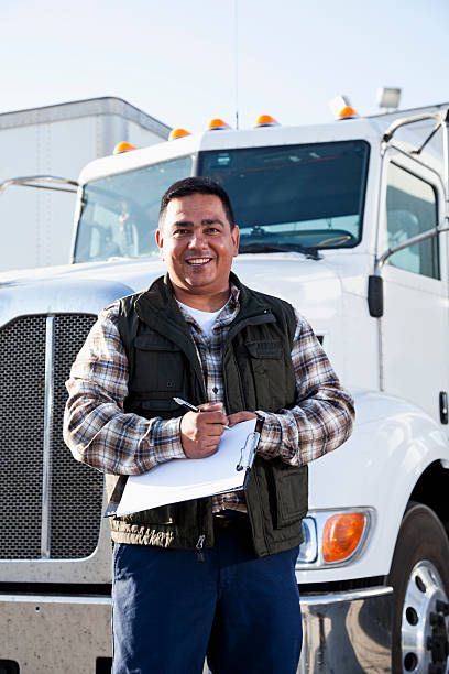 istock Hispanic truck driver with clipboard 171241294