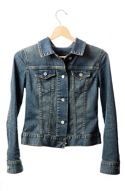 Buttoned denim jacket with hanger stock photo