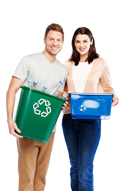 istock Eco-friendly couple with recycle bins 171241781