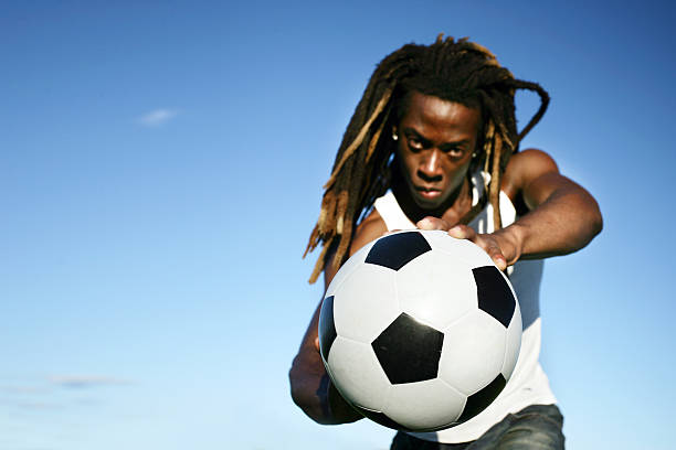 istock Man holding a soccer ball 171241947