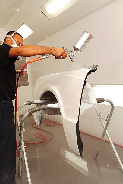 istock Spraying Primer on a Fender 171241964