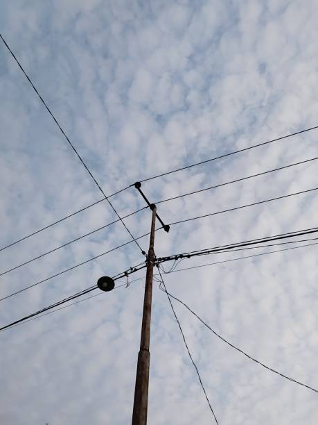 istock Electric pole with a street light attached to it 1712420425