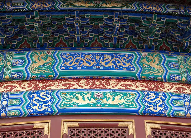 Beijing, China.  Decoration on the Temple of Heaven. This Hall of Prayer for Good Harvests is a triple-gabled circular building, 36 meters in diameter and 38 meters tall,  The building is completely wooden, with no nails.