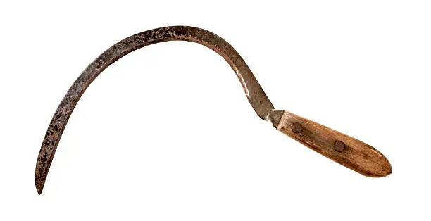 Antique sickle isolated on white background.