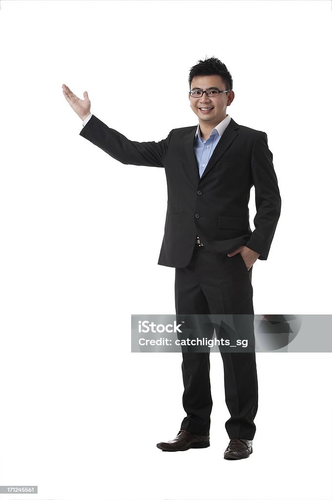 Asian Business Man Asian business man gesturing showing with confident smile, in full length portrait isolated on white background. 30-39 Years Stock Photo