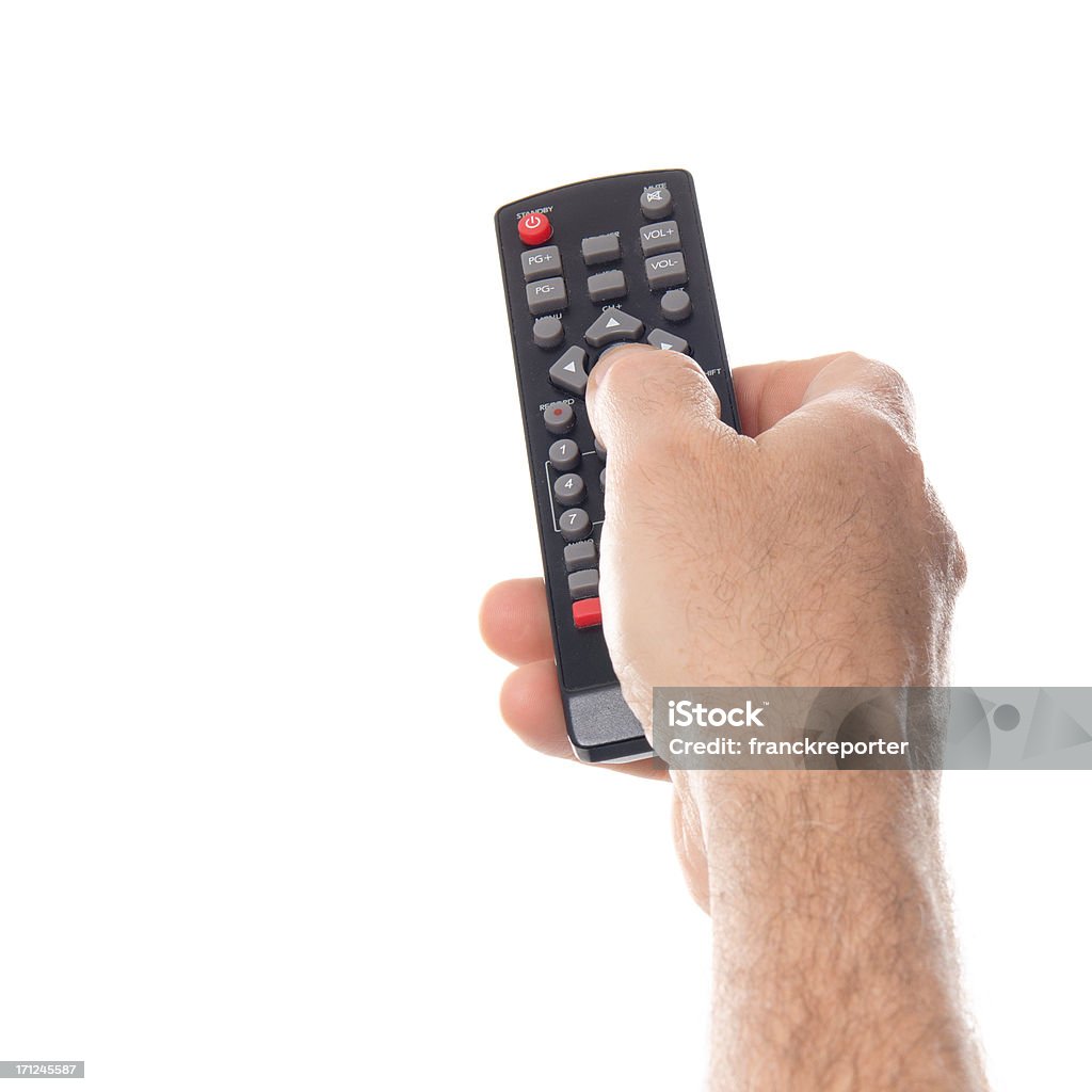 Zapping com controle remoto da tv - Foto de stock de Controle Remoto royalty-free