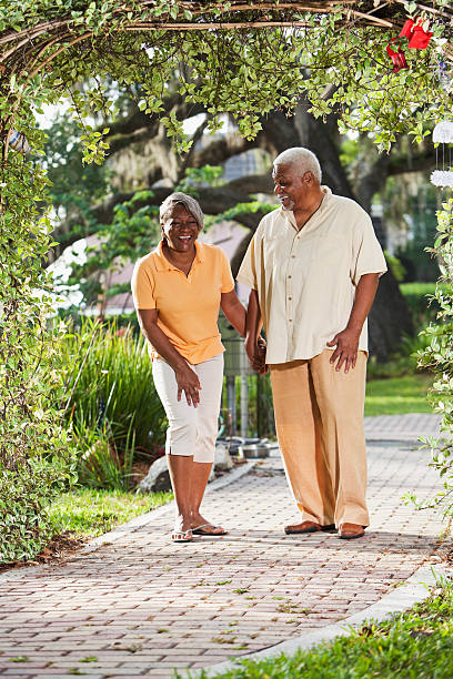 istock Senior African American couple holding hands 171245602