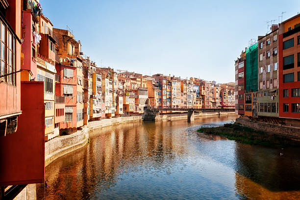 A view of the medieval Houses of the Onyar, situated on the banks of the River Onyar, Girona, Spain