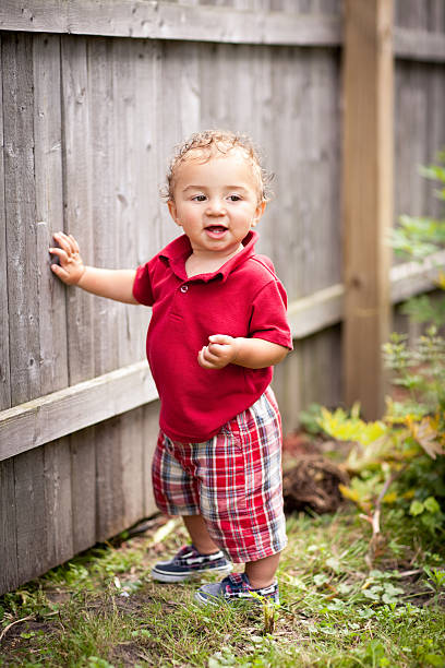 Color Image of Toddler Boy Playing Outside on Summer Day