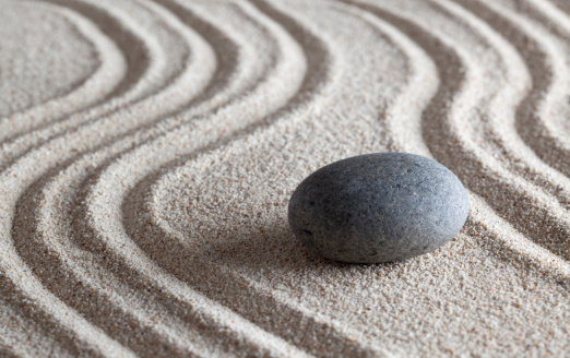 zen stone and sand garden one round stone