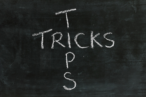 TIPS and TRICKS  words in blackboard