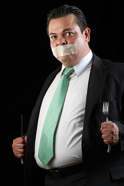 Desesperate hungry man Hungry man. obesidade stock pictures, royalty-free photos & images