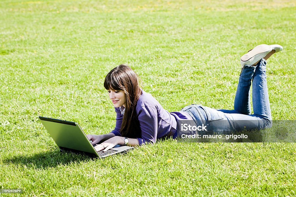 Young woman using laptop at the Park 20-29 Years Stock Photo