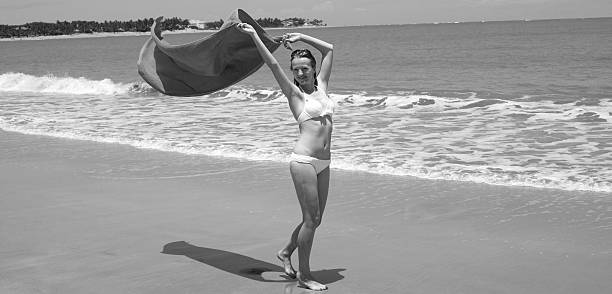 istock Woman on Beach with Towel 171248889