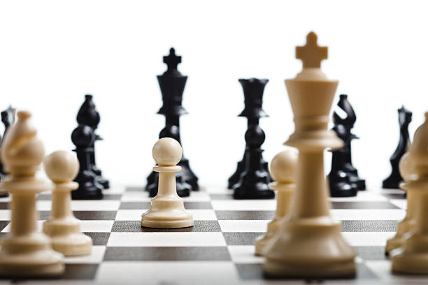Chess Moving the pawn in a game of chess chess board photos stock pictures, royalty-free photos & images