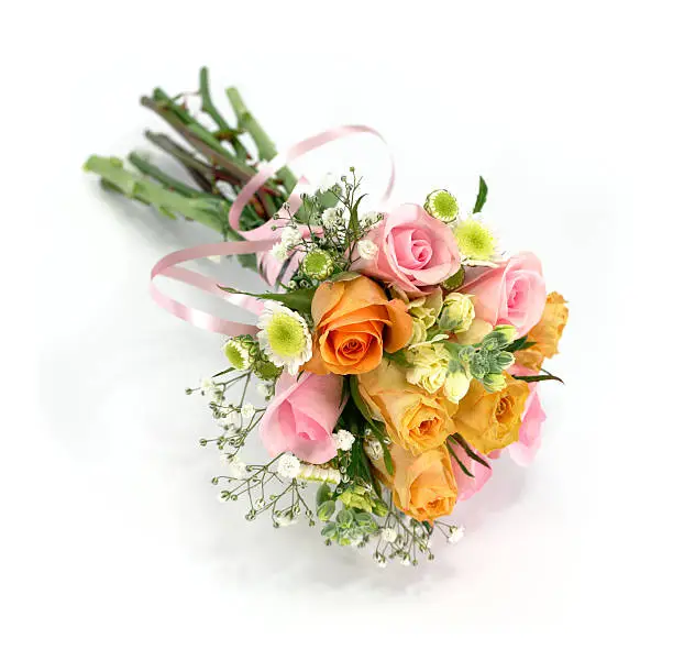Photo of Multi colored wedding rose bouquet or posy isolated on white