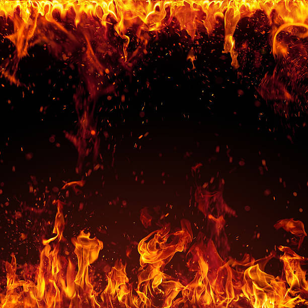 XXXL Fire with bright sparks isolated on black background