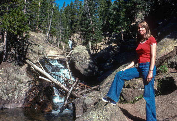 istock Rocky Mountain NP - Fall River Road - Hiker Poses at Chasm Falls - 1977 1712494292