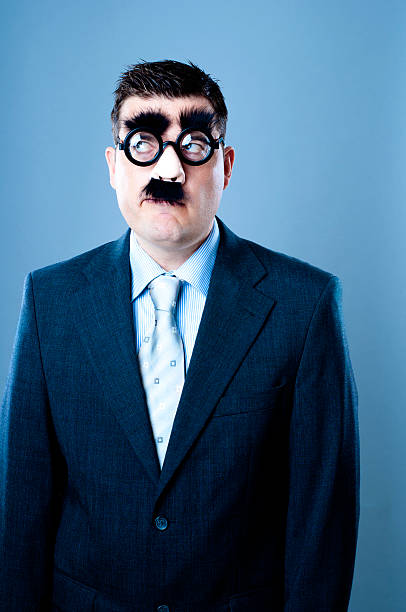 istock Funny looking businessman is thinking about something 171250009